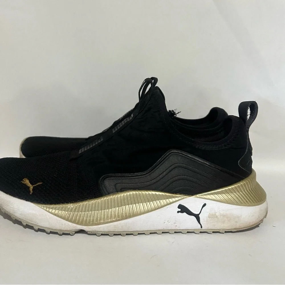 Puma Women’s Black and Gold Athletic Shoes